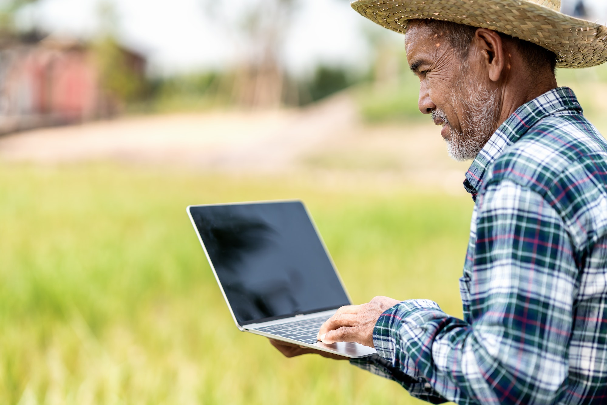 Asian agriculture technology concept of smart farmer smile